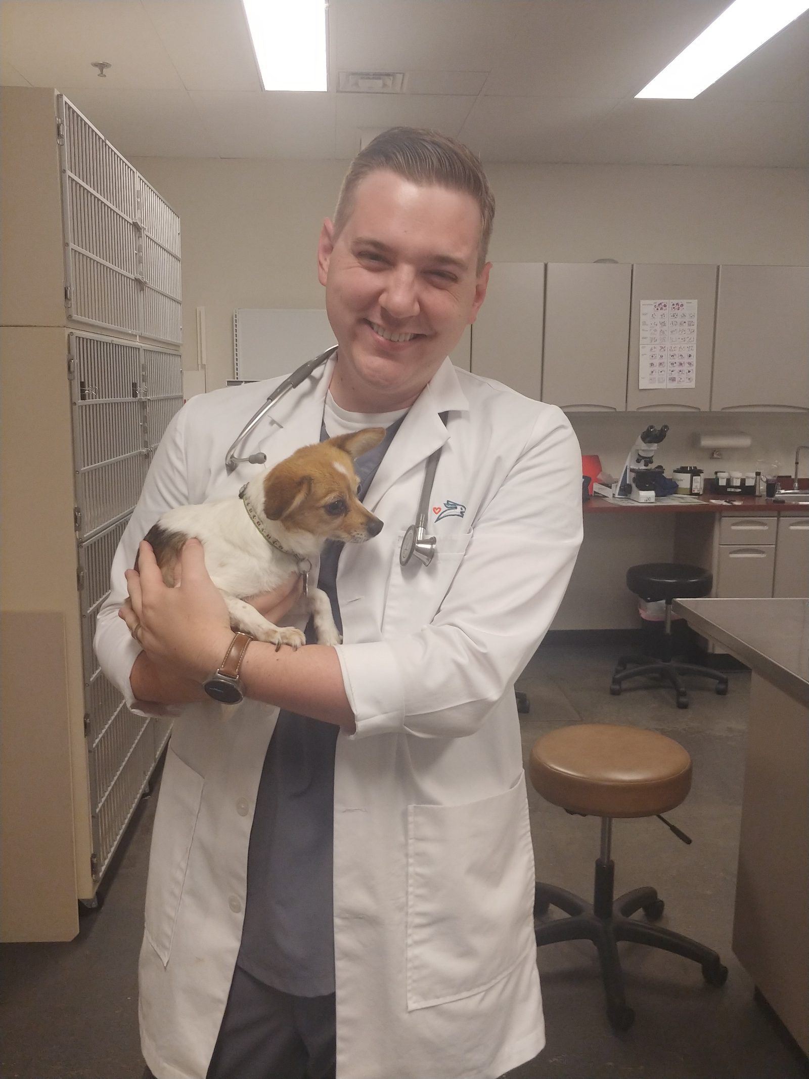 Dr. Tanner Johnson holding a little dog